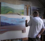Roy painting in his studio